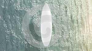 Blank white surfboard on water surface mockup, top view