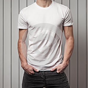 Blank white t-shirt on man`s body