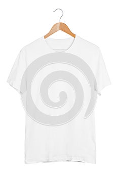 Blank white t-shirt on wooden hanger isolated on white background photo