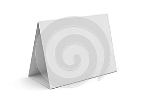 Blank white table tent card standing on a white surface ready for custom text or design