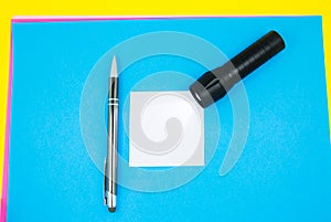 Blank white To Do List Sticker with flashlight and pen. Searching information on the Internet. Close up of reminder note paper on