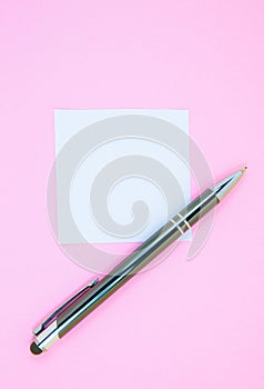 Blank white To Do List Sticker with pen. Searching information on the Internet..Close up of reminder note paper on the pink