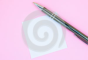 Blank white To Do List Sticker with pen. Searching information on the Internet..Close up of reminder note paper on the pink