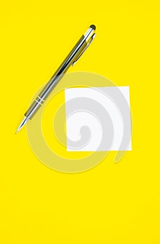 Blank white To Do List Sticker with pen. Searching information on the Internet..Close up of reminder note paper on the yellow