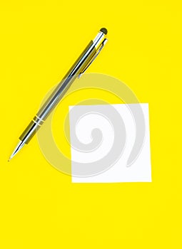 Blank white To Do List Sticker with pen. Searching information on the Internet..Close up of reminder note paper on the yellow