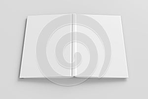 Blank white vertical open and upside down book cover on white background isolated with clipping path around cover.