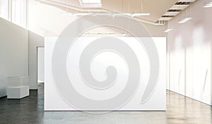 Blank white wall mockup in sunny modern empty gallery photo