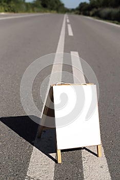 blank whiteboard on the road