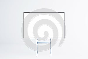 Blank whiteboard on a stand in a modern studio. 3D Rendering
