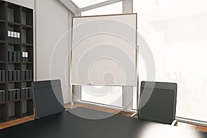 Blank whiteboard stand in room