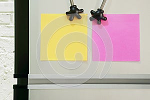 Blank Yellow, Pink Paper Notes Sticked on Refridgerator Door for Add Text Message photo