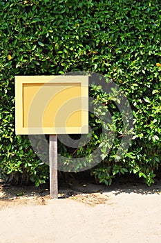 Blank yellow wooden sign