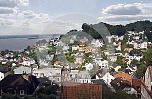 Blankenese is a posh suburb of Hamburg, The beautiful houses of Blankenese in the background the river Elbe. Germany, Europe photo