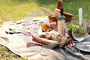 Blanket with food prepared for summer picnic