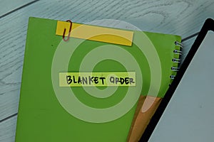 Blanket Order write on sticky notes isolated on Wooden Table