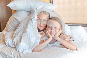 Blanket over family glad daughter woman bed head young eyes, from lying morning for cell for health happy, bedding photo