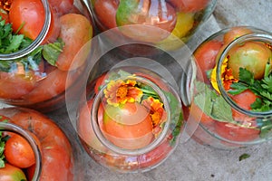 Blanks for the winter. Marinated. Red and yellow tomatoes in jars