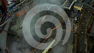 Blast furnace view from the air. Old factory. Aerial view over industrialized city with air atmosphere and river water