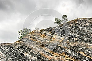 Blasted mountain orange grey rock.