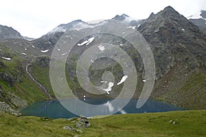 Blaue Lacke lake at Stubai high-altitude hiking trail, lap 6 in Tyrol, Austria
