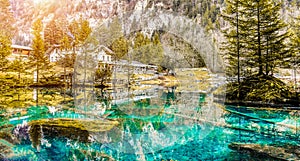BLAUSEE KANDERGRUND, SWITZERLAND - DECEMBER 18, 2016:Blue Lake nature park in winter Kandersteg, Switzerland.Paradise mountain