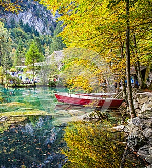 Blausee, Switzerland - Red Boats and Fall Foliage