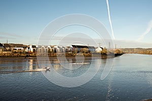 Blaydon on Tyne UK: Jan 2022: Rowers on the River Tyne on a early sunday morning. Rowing water sport exercise