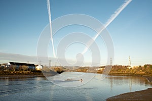 Blaydon on Tyne UK: Jan 2022: Rowers on the River Tyne on a early sunday morning. Rowing water sport exercise