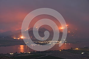 Blazing orange and yellow sky caused by a wildfire near Osoyoos Lake, British Columbia, Canada