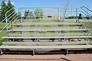 Bleachers at basefield field at a local community park.