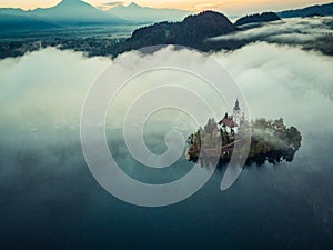 Bled castle on lake in foggy autumn morning,SLovenia