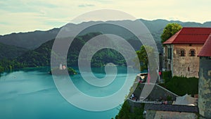 Bled castle located on steep cliff above lake in Slovenia