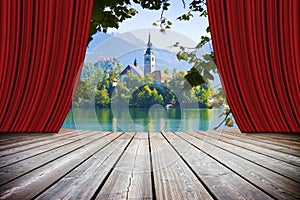 Bled lake, the most famous lake in Slovenia with the island of the church Europe - Slovenia - concept with open theater and red