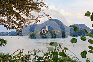 Bled lake in Slovenia, romantic island with christian church in the center of a lake photo