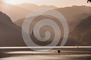 Bled Lake in the sunset with boat