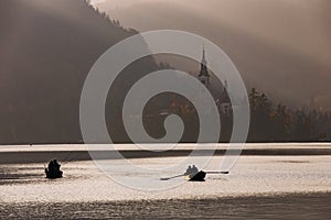 Bled Lake in the sunset with boat