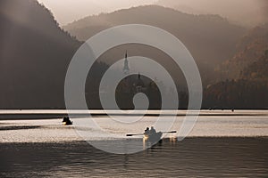 Bled Lake in the sunset with boat