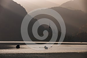 Bled Lake in the sunset with boat