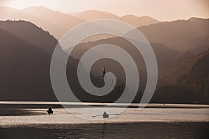 Bled Lake in the sunset with boat