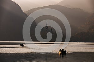 Bled Lake in the sunset with boat