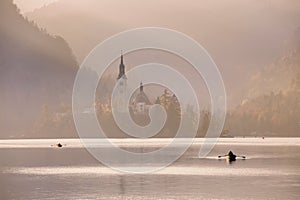 Bled Lake in the sunset with boat