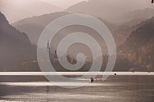 Bled Lake in the sunset with boat