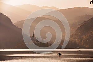 Bled Lake in the sunset with boat