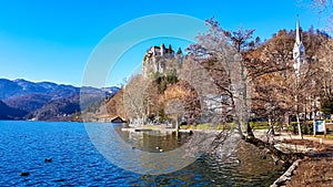 Bled - Panoramic view of St Mary Church of Assumption on the small island and castle at alpine lake