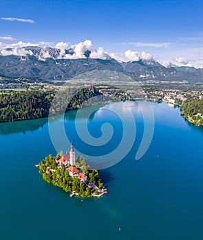 Bled, Slovenia - Aerial panoramic drone view of Lake Bled Blejsko Jezero from high above on a bright summer day