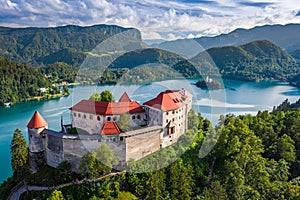 Bled, Slovenia - Aerial view of beautiful Bled Castle Blejski Grad with Lake Bled Blejsko Jezero on a bright summer day