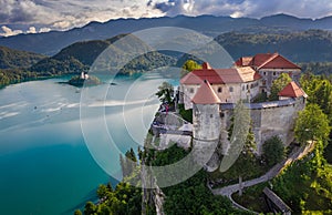 Bled, Slovenia - Aerial view of beautiful Bled Castle Blejski Grad with Pilgrimage Church of the Assumption of Maria photo