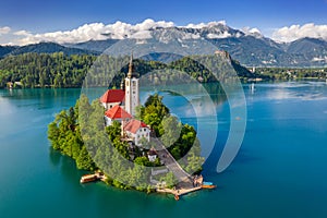 Bled, Slovenia - Aerial view of beautiful Lake Bled Blejsko Jezero with the Pilgrimage Church of the Assumption of Maria photo