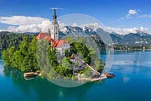 Bled, Slovenia - Aerial view of Lake Bled Blejsko Jezero with the Pilgrimage Church of the Assumption of Maria, pletna boats