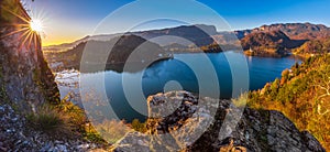 Bled, Slovenia - Beautiful autumn sunrise at Lake Bled on a panoramic shot with Pilgrimage Church of the Assumption of Maria